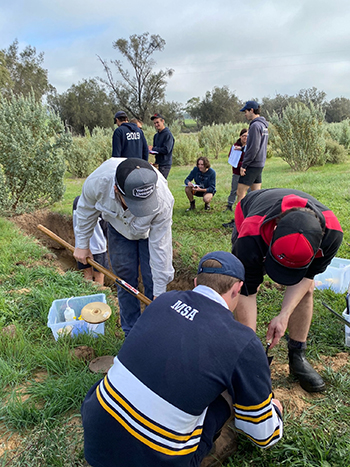 Students from the Muresk Institute in Western Australia collect soil samples