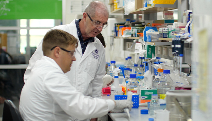 Mark Jackson and David Craik in lab