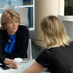 Professor Naomi Wray chats with volunteer