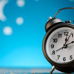 Alarm clock in night sky