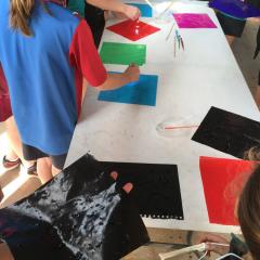 Students participating in a crystal painting activity as part of Catch a Rising Star program