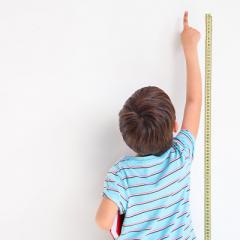 Boy measuring height